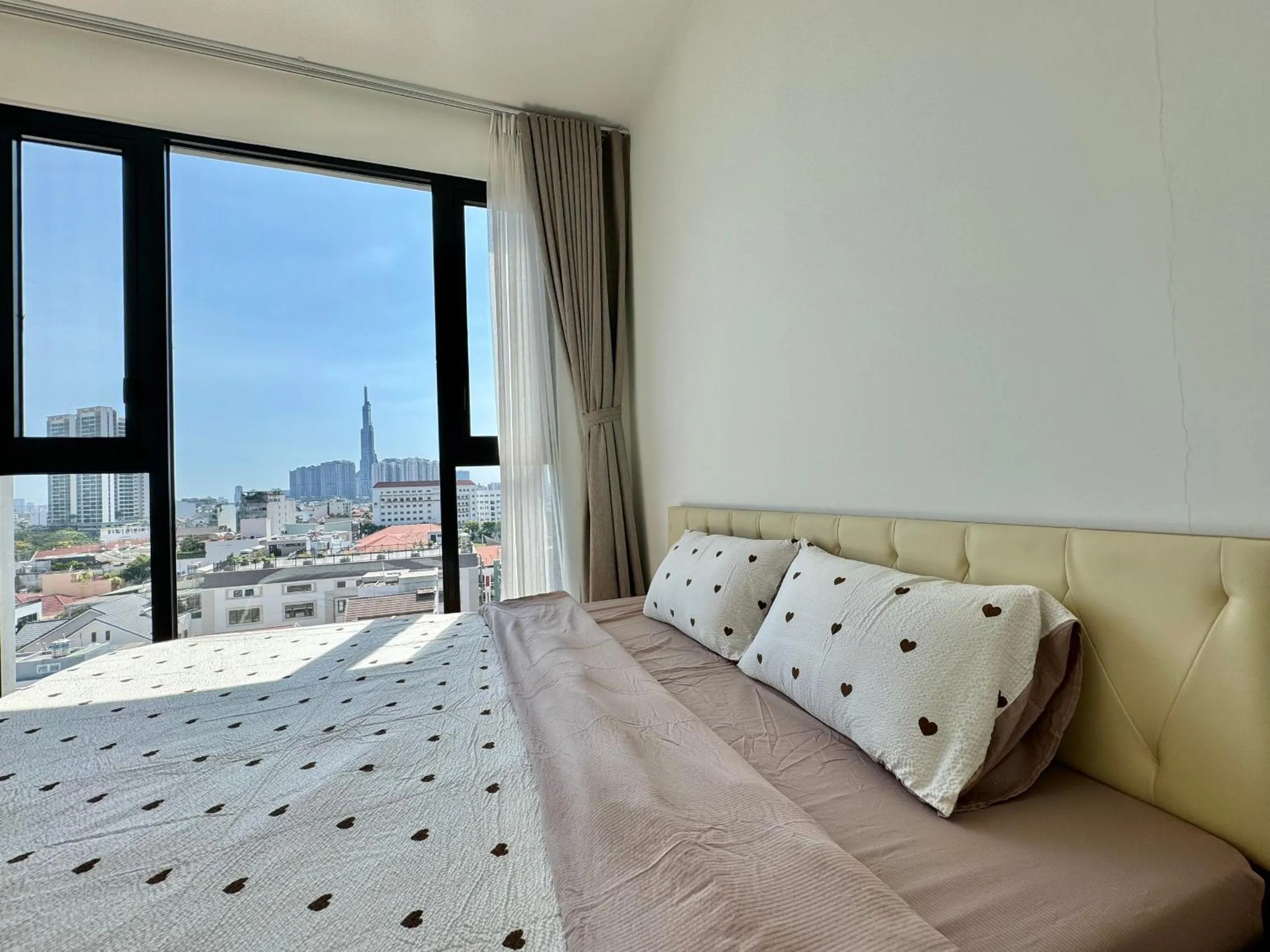 Bed in Homie's Dedge Thao Dien Luxury Apartment