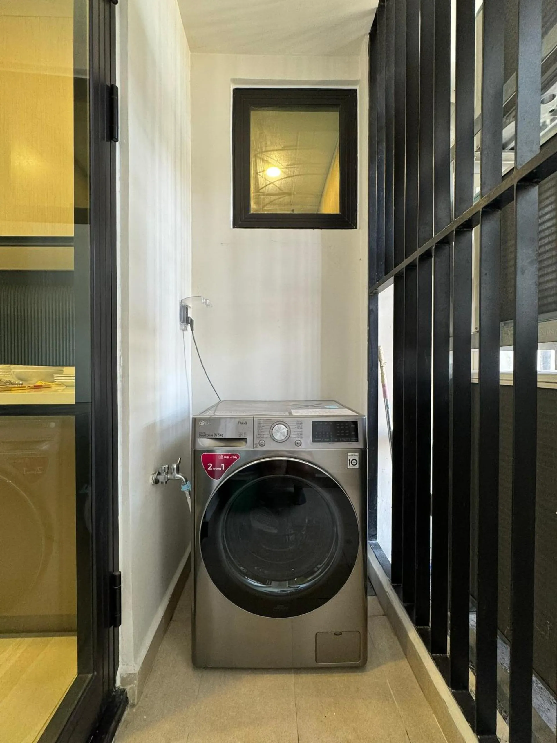 washing machine in Homie's Dedge Thao Dien Luxury Apartment