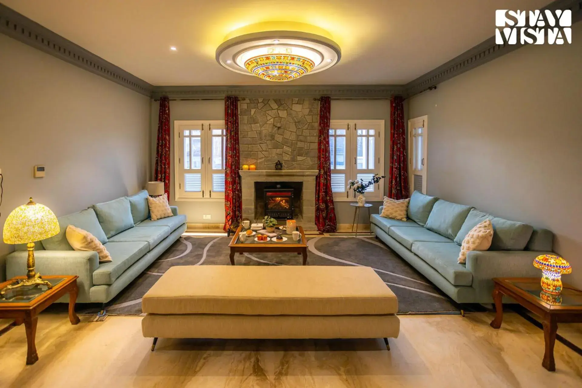 Living room in StayVista at Midsummer Moon - Mountain View with Courtyard Living room in StayVista at Midsummer Moon - Mountain View with Courtyard