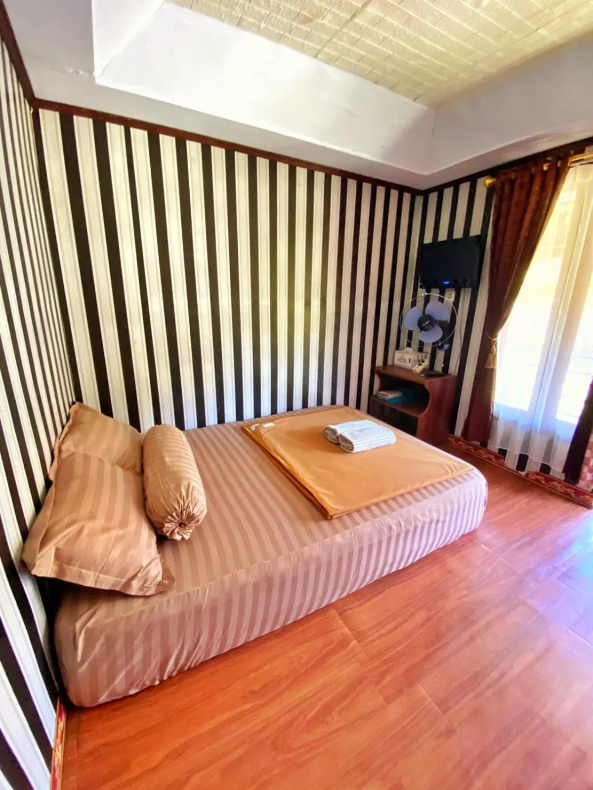 Bed in Puncak Rinjani Lodge
