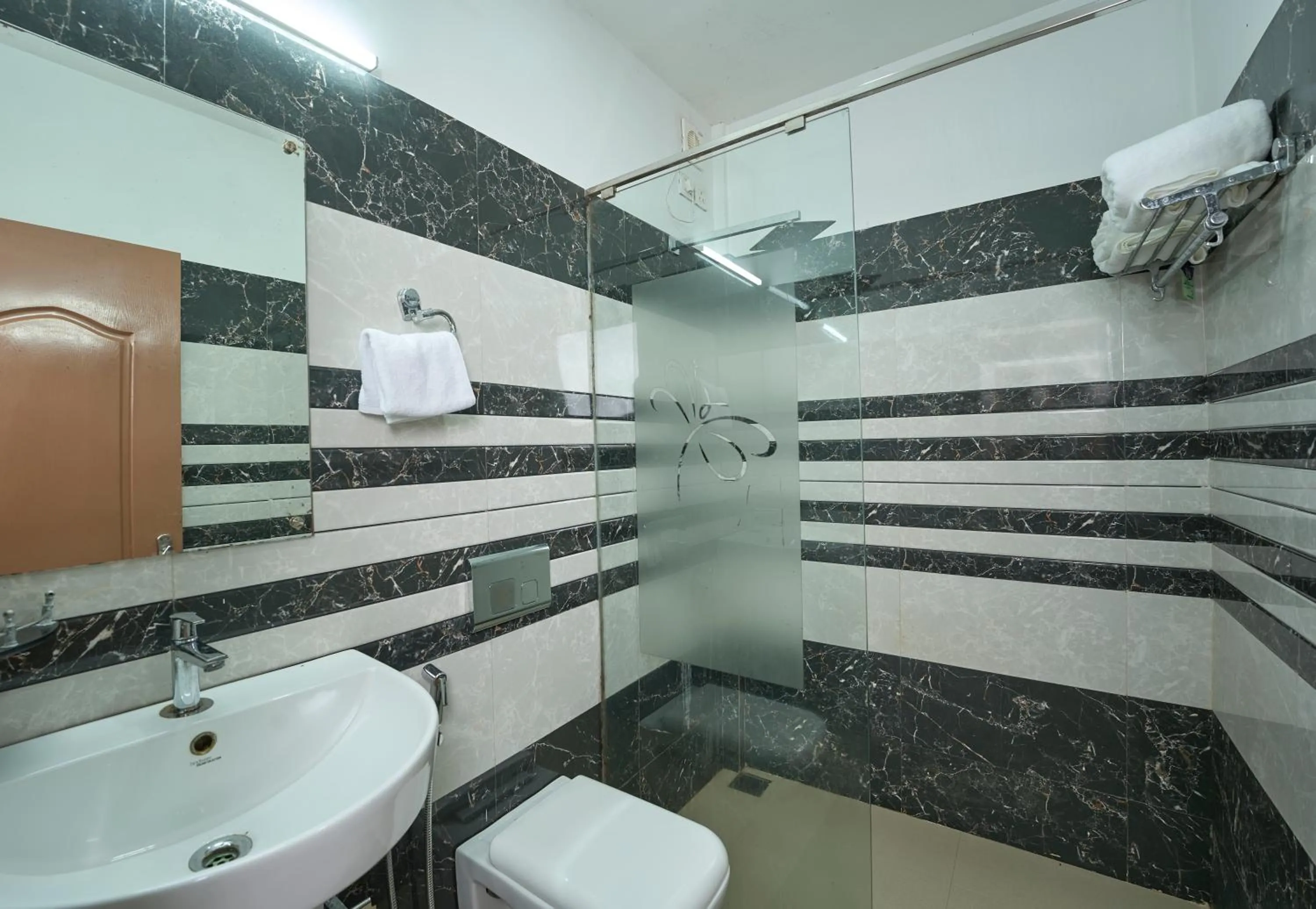 Toilet in MIRAS PMC Lakeshore Resort