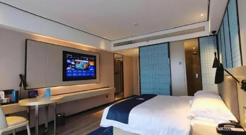 Bed in Echarm Hotel Changjiang Shilu