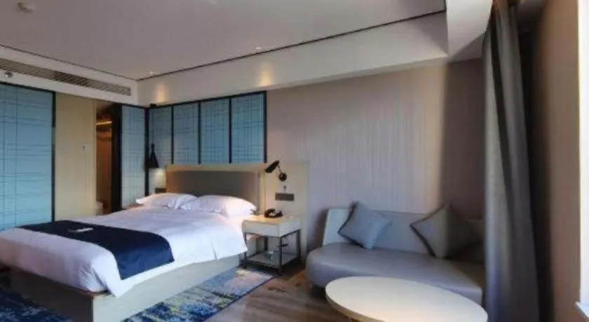 Bed in Echarm Hotel Changjiang Shilu