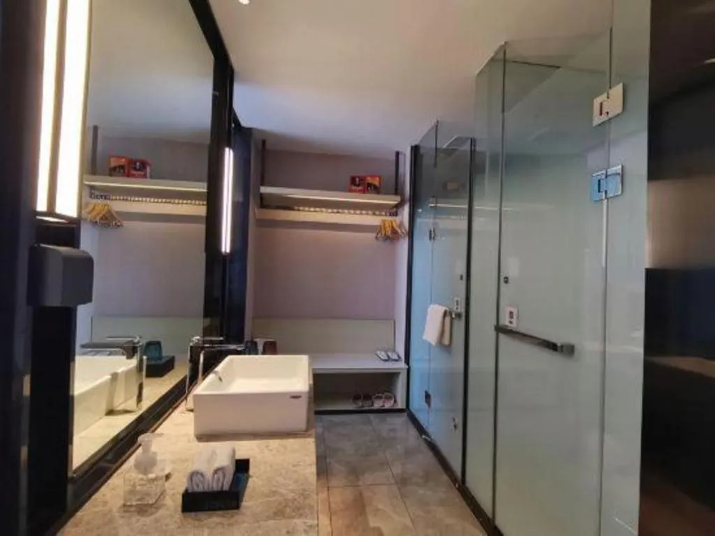 Bed in Echarm Hotel Changjiang Shilu