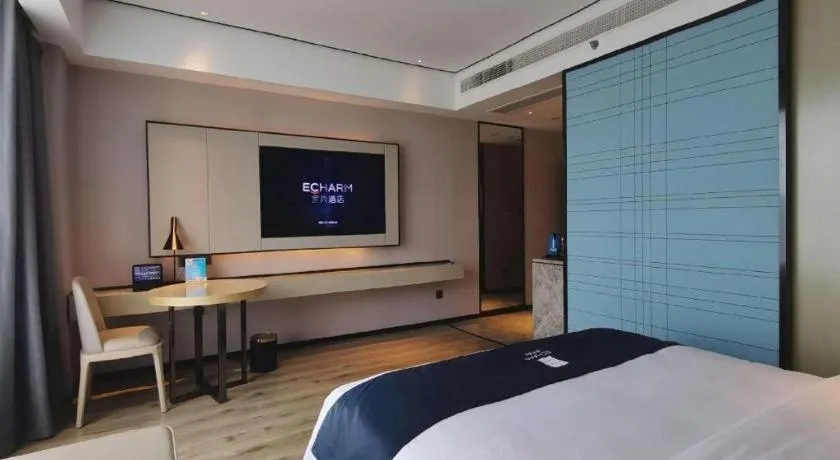 Bed in Echarm Hotel Changjiang Shilu