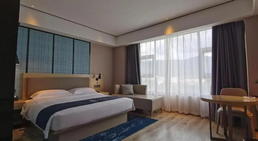Bed in Echarm Hotel Changjiang Shilu