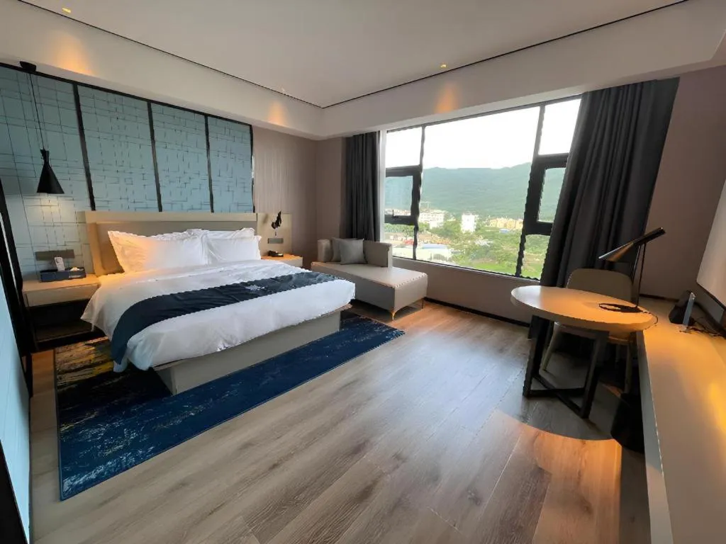 Bed in Echarm Hotel Changjiang Shilu