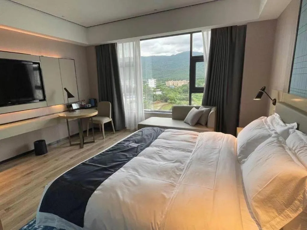 Bed in Echarm Hotel Changjiang Shilu