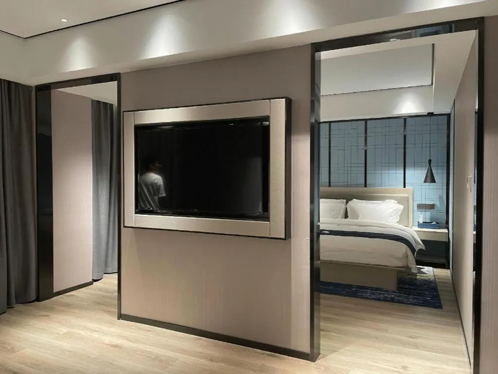 Bed in Echarm Hotel Changjiang Shilu