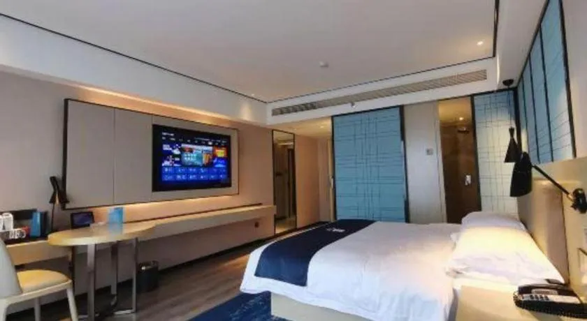 Bed in Echarm Hotel Changjiang Shilu