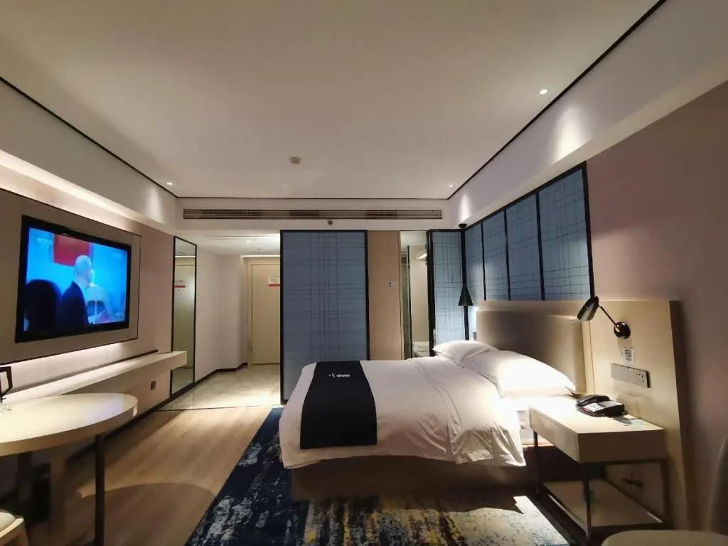 Bed in Echarm Hotel Changjiang Shilu