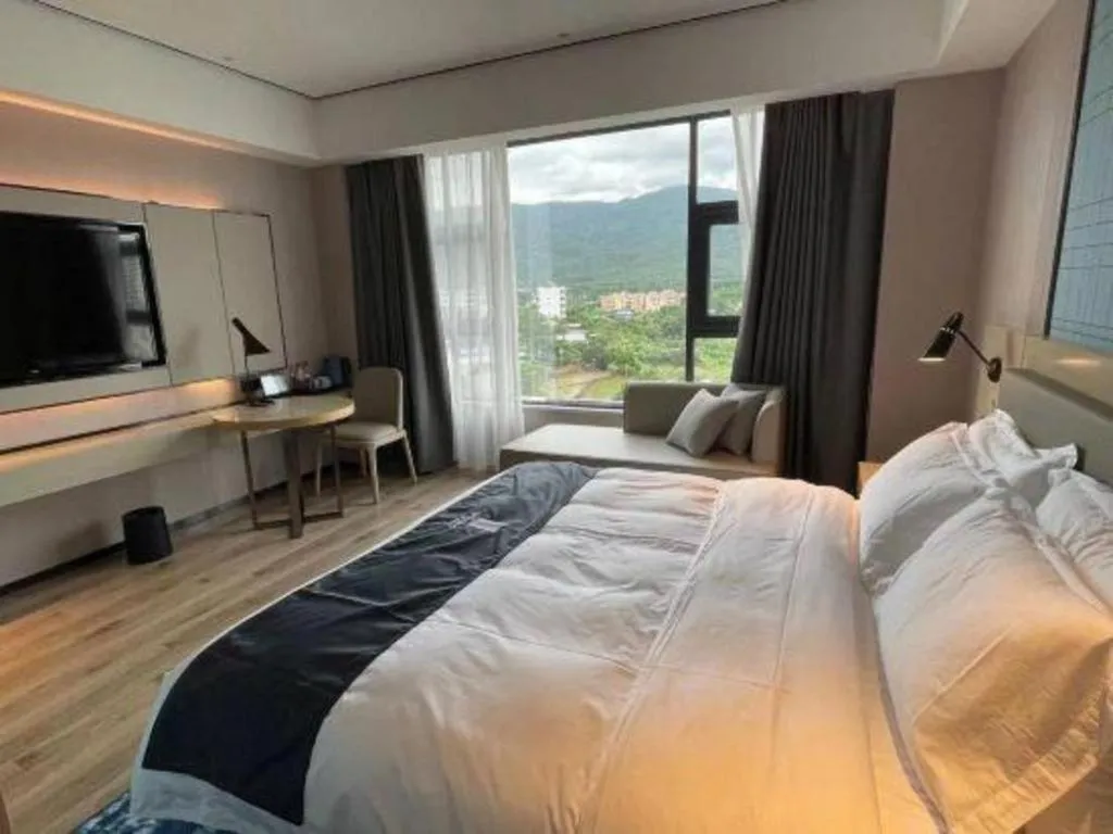 Bed in Echarm Hotel Changjiang Shilu