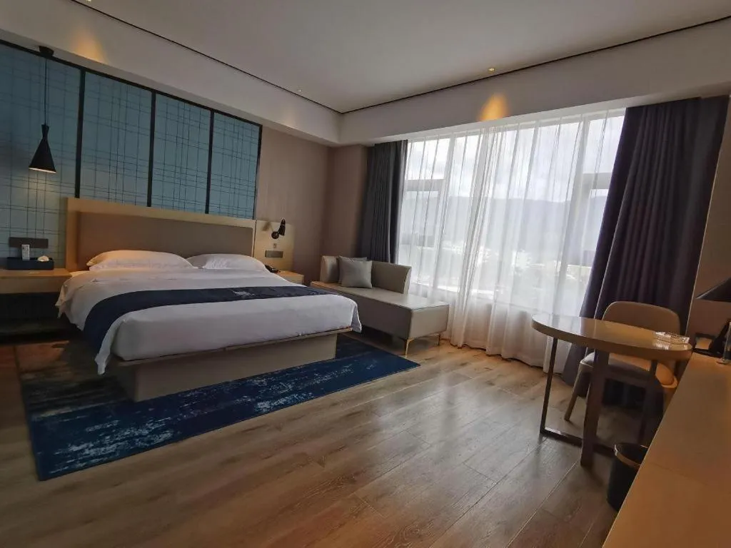 Bed in Echarm Hotel Changjiang Shilu