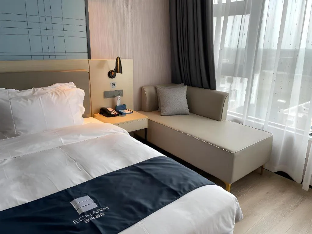 Bed in Echarm Hotel Changjiang Shilu