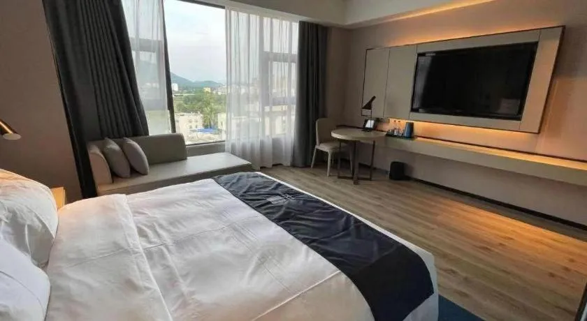 Bed in Echarm Hotel Changjiang Shilu