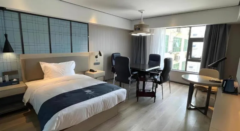 Bed in Echarm Hotel Changjiang Shilu