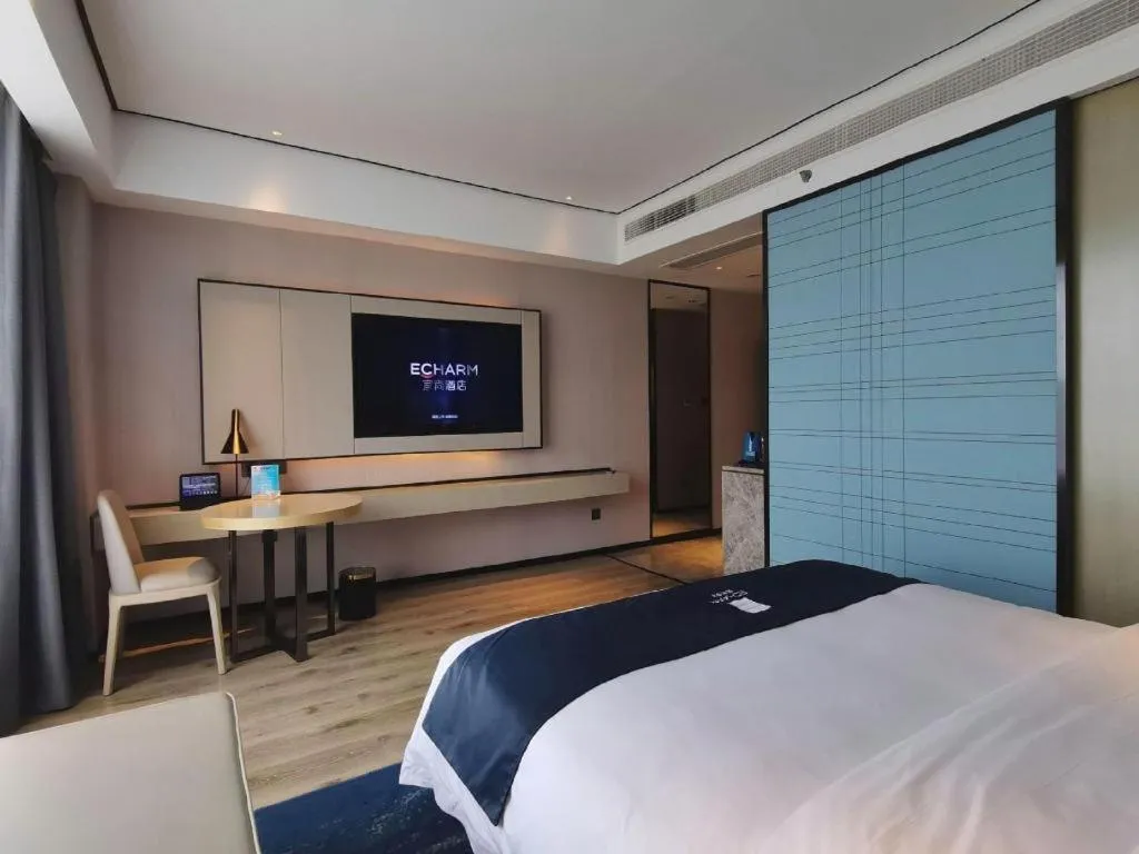 Bed in Echarm Hotel Changjiang Shilu