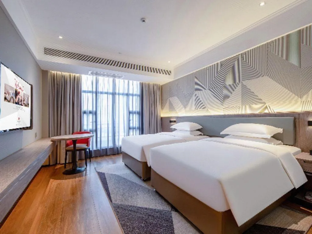 Bed in Borrman Hotel Nanning Wuming Center