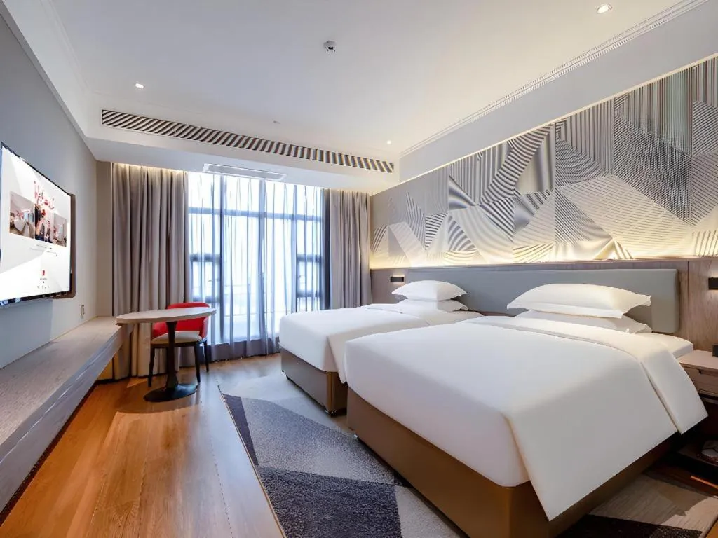 Bed in Borrman Hotel Nanning Wuming Center