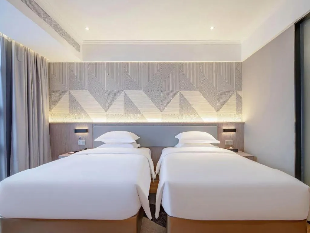 Bed in Borrman Hotel Nanning Wuming Center