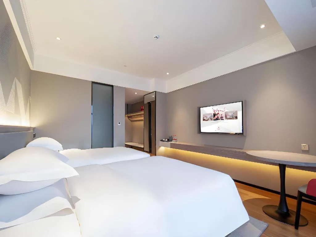 Bed in Borrman Hotel Nanning Wuming Center