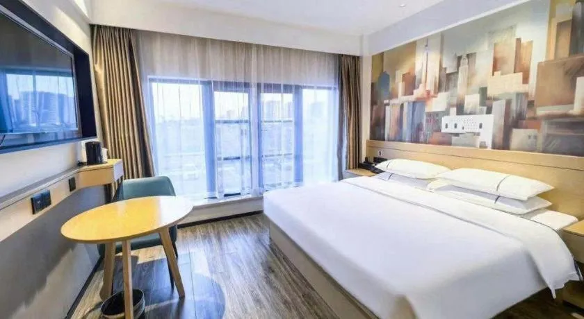 Bed in City Comfort Inn Wuhan Yangluo Wanda Plaza