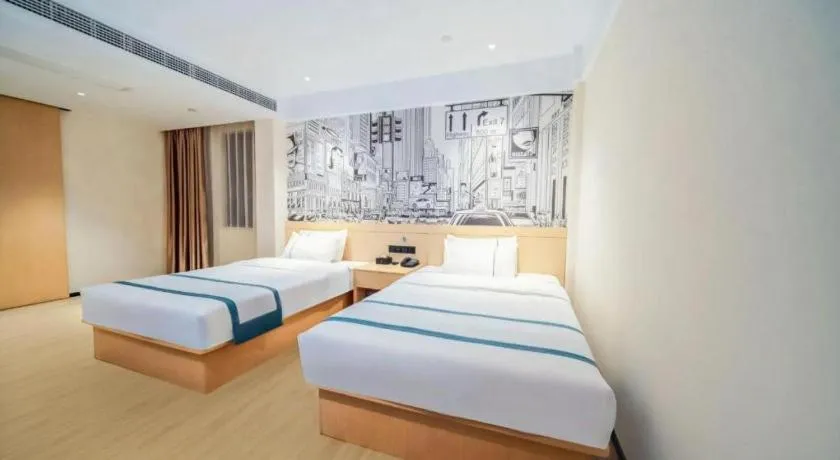 Bed in City Comfort Inn Wuhan Yangluo Wanda Plaza