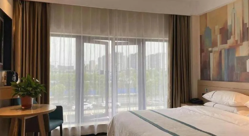 Bed in City Comfort Inn Wuhan Yangluo Wanda Plaza