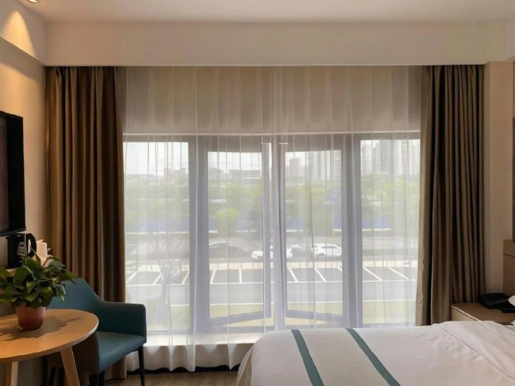 Bed in City Comfort Inn Wuhan Yangluo Wanda Plaza