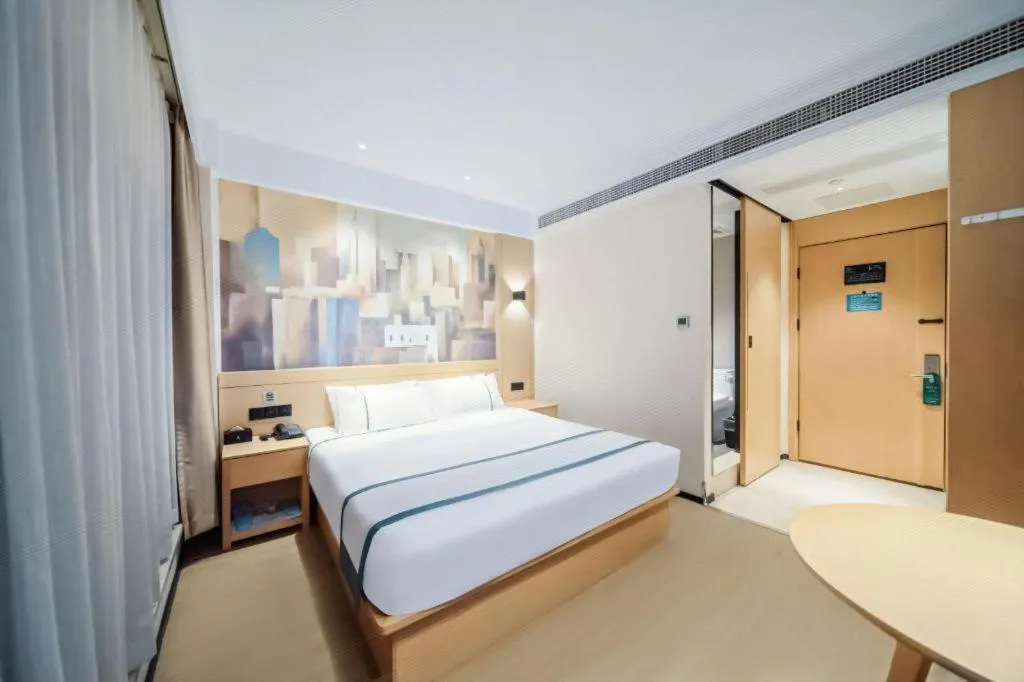 Bed in City Comfort Inn Wuhan Yangluo Wanda Plaza