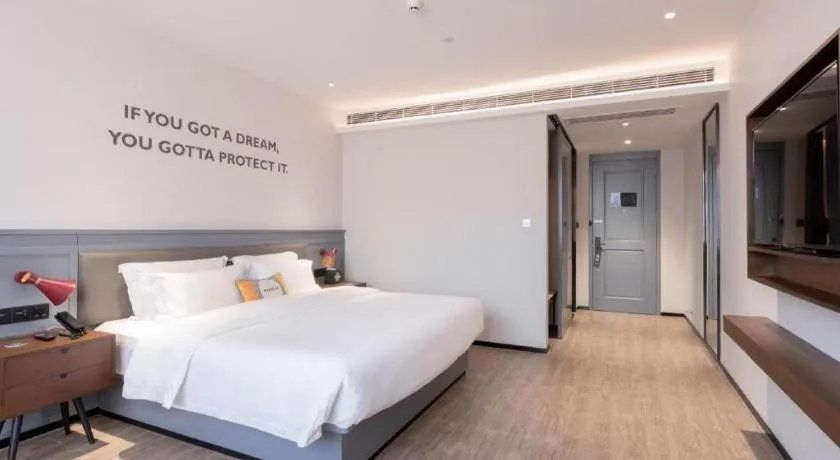 Bed in City Comfort Premier Hotel Nanning Guangxi University Zoo Metro Station