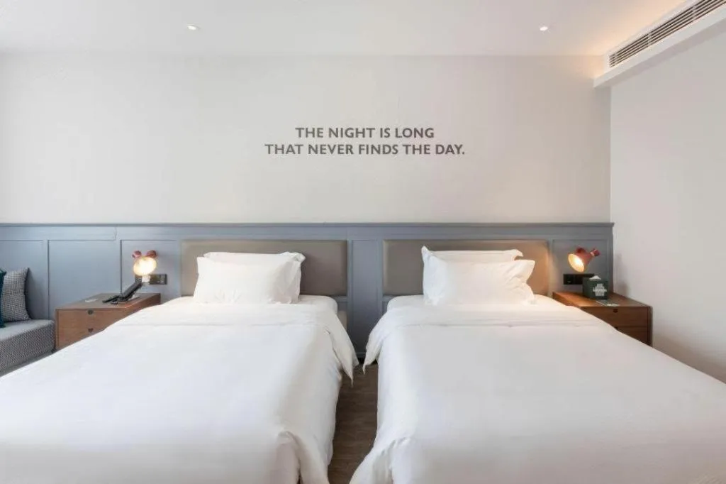 Bed in City Comfort Premier Hotel Nanning Guangxi University Zoo Metro Station