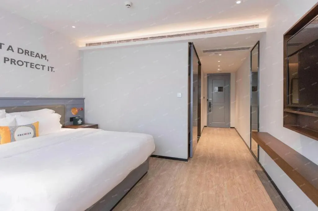 Bed in City Comfort Premier Hotel Nanning Guangxi University Zoo Metro Station