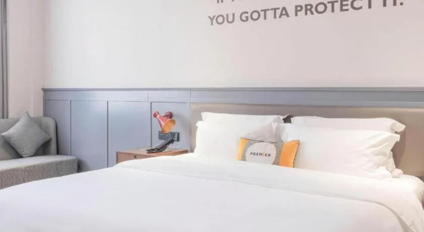 Bed in City Comfort Premier Hotel Nanning Guangxi University Zoo Metro Station