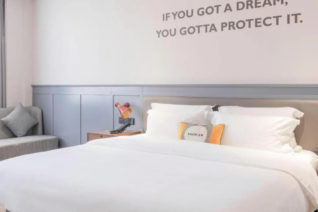 Bed in City Comfort Premier Hotel Nanning Guangxi University Zoo Metro Station