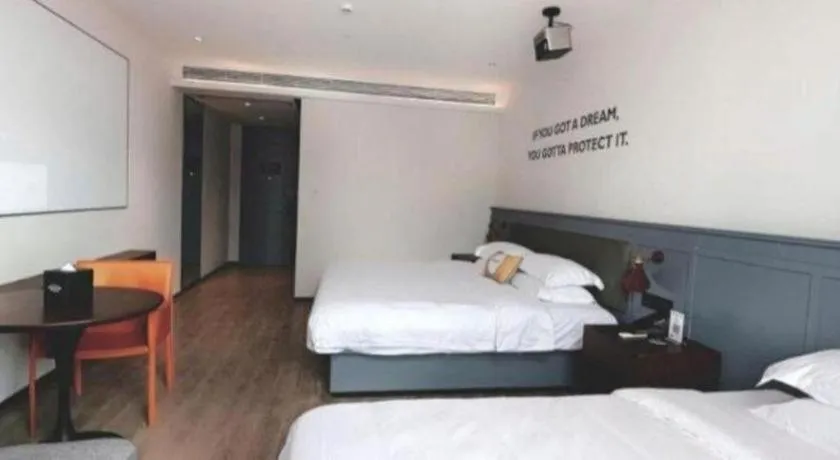 Bed in City Comfort Premier Hotel Nanning Guangxi University Zoo Metro Station