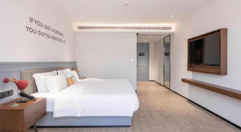 Bed in City Comfort Premier Hotel Nanning Guangxi University Zoo Metro Station