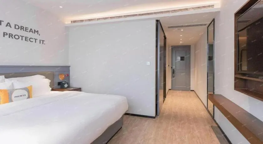 Bed in City Comfort Premier Hotel Nanning Guangxi University Zoo Metro Station