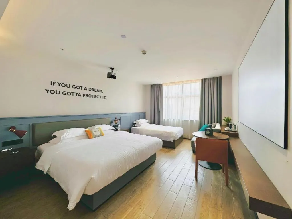 Bed in City Comfort Premier Hotel Nanning Guangxi University Zoo Metro Station