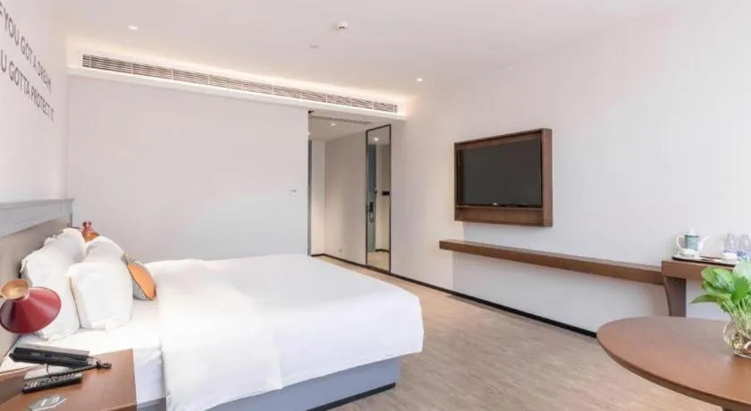 Bed in City Comfort Premier Hotel Nanning Guangxi University Zoo Metro Station