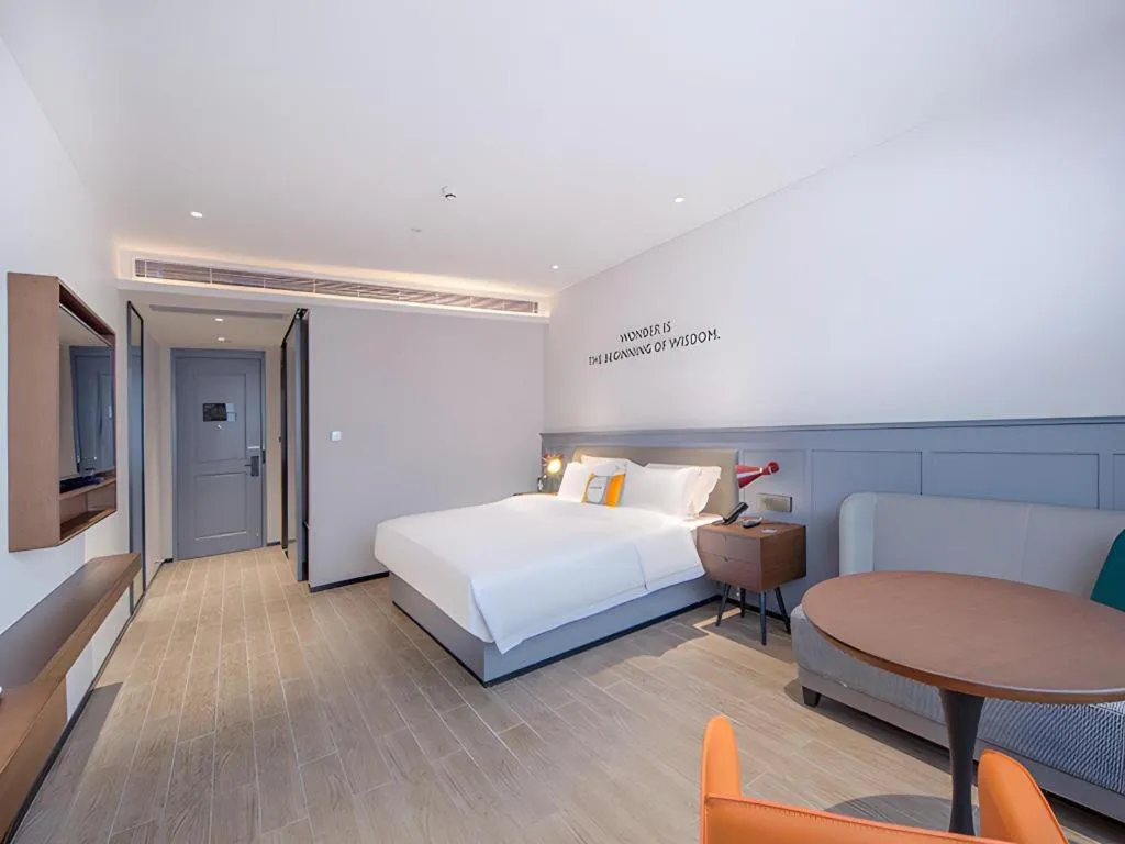 Bed in City Comfort Premier Hotel Nanning Guangxi University Zoo Metro Station