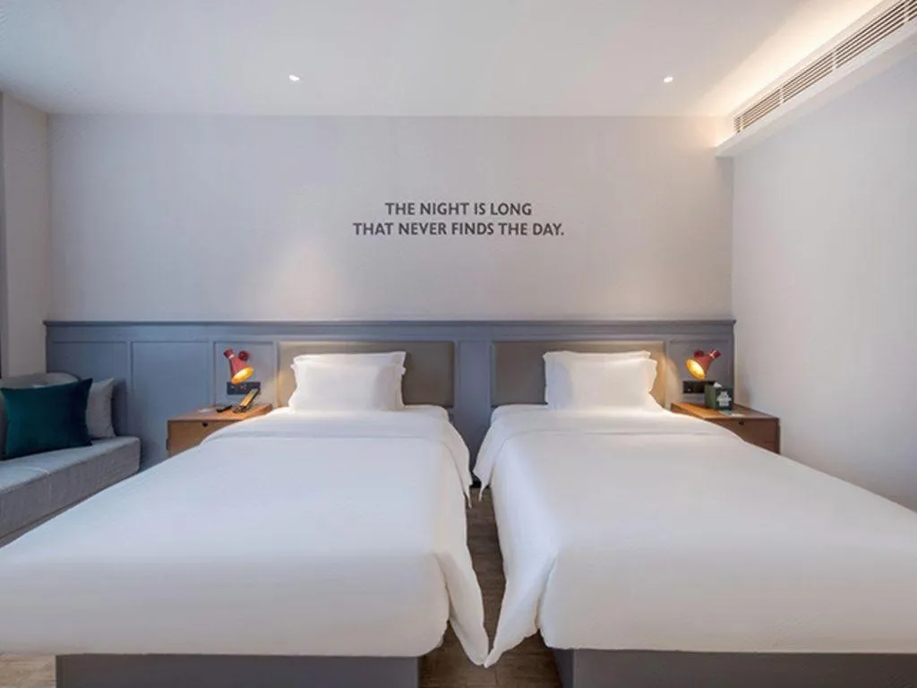 Bed in City Comfort Premier Hotel Nanning Guangxi University Zoo Metro Station