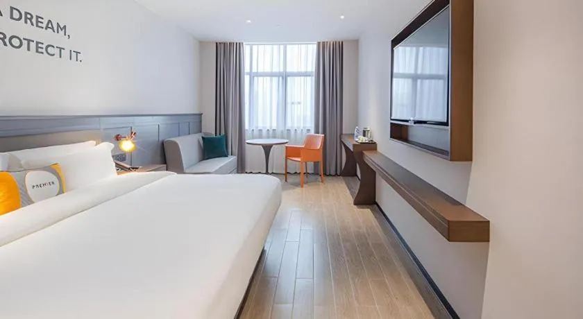 Bed in City Comfort Premier Hotel Nanning Guangxi University Zoo Metro Station