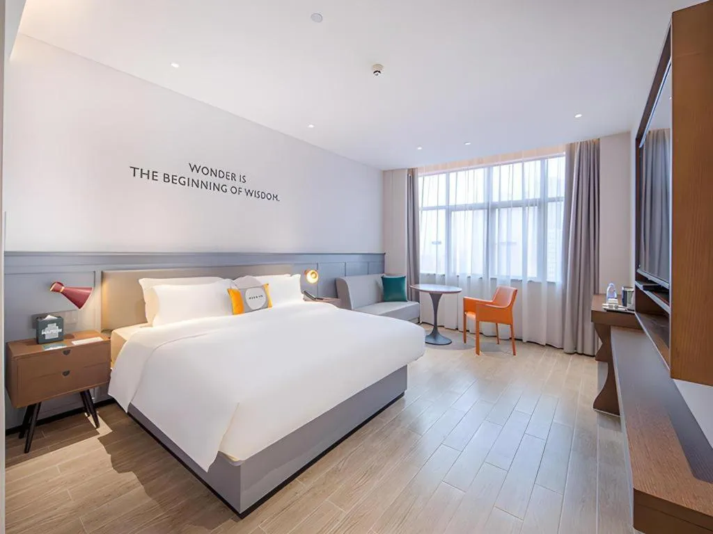 Bed in City Comfort Premier Hotel Nanning Guangxi University Zoo Metro Station