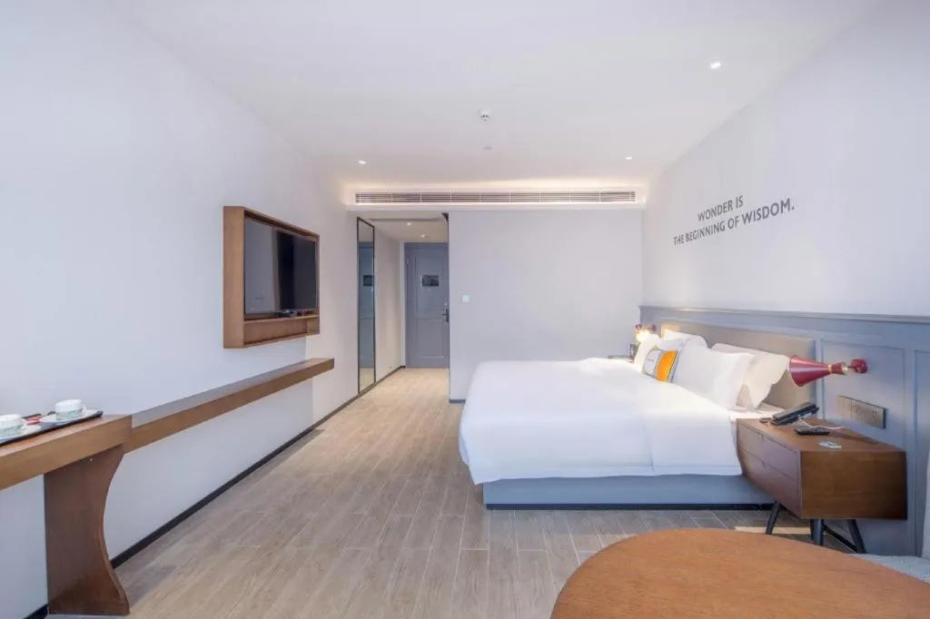 Bed in City Comfort Premier Hotel Nanning Guangxi University Zoo Metro Station