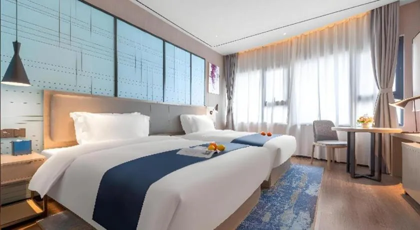 Bed in Echarm Hotel Zhuzhou Liling