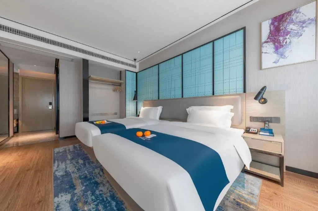 Bed in Echarm Hotel Zhuzhou Liling
