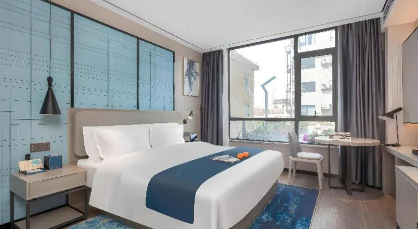 Bed in Echarm Hotel Zhuzhou Liling
