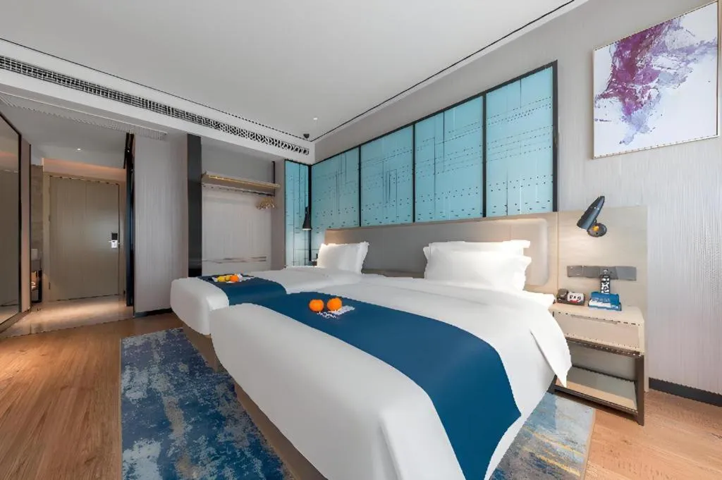 Bed in Echarm Hotel Zhuzhou Liling