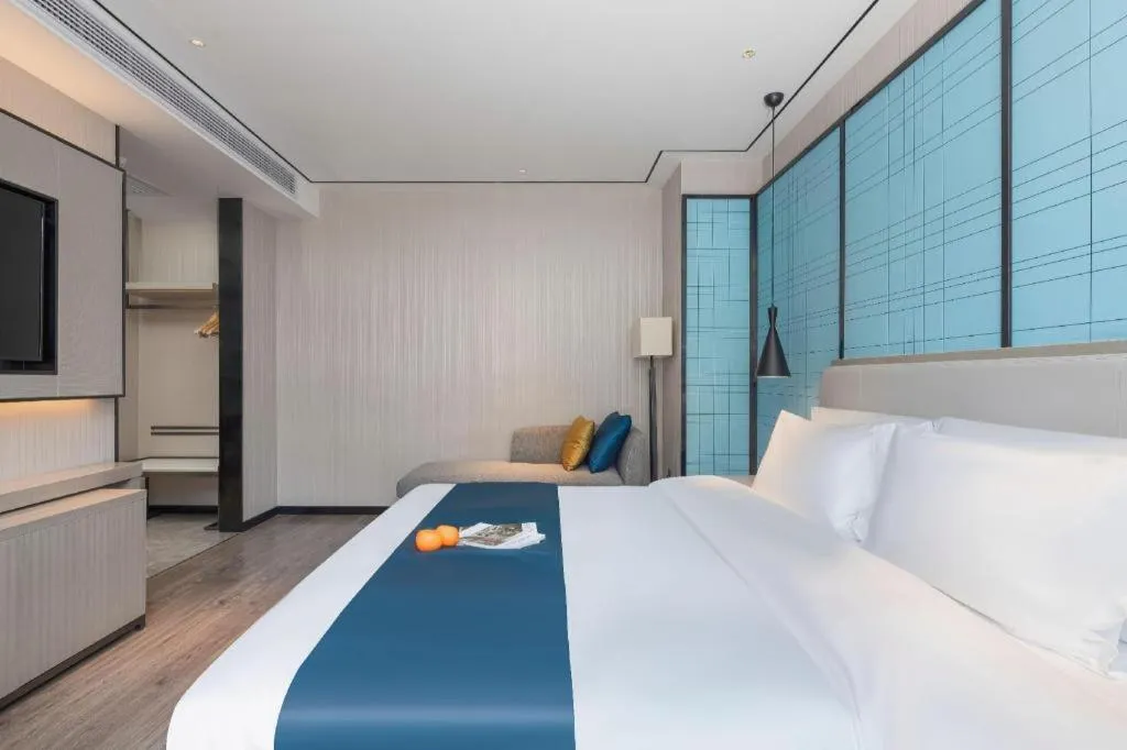 Bed in Echarm Hotel Zhuzhou Liling